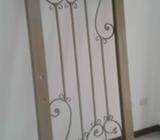 Puertas con Hierro Forjado y Puertas Enrollables